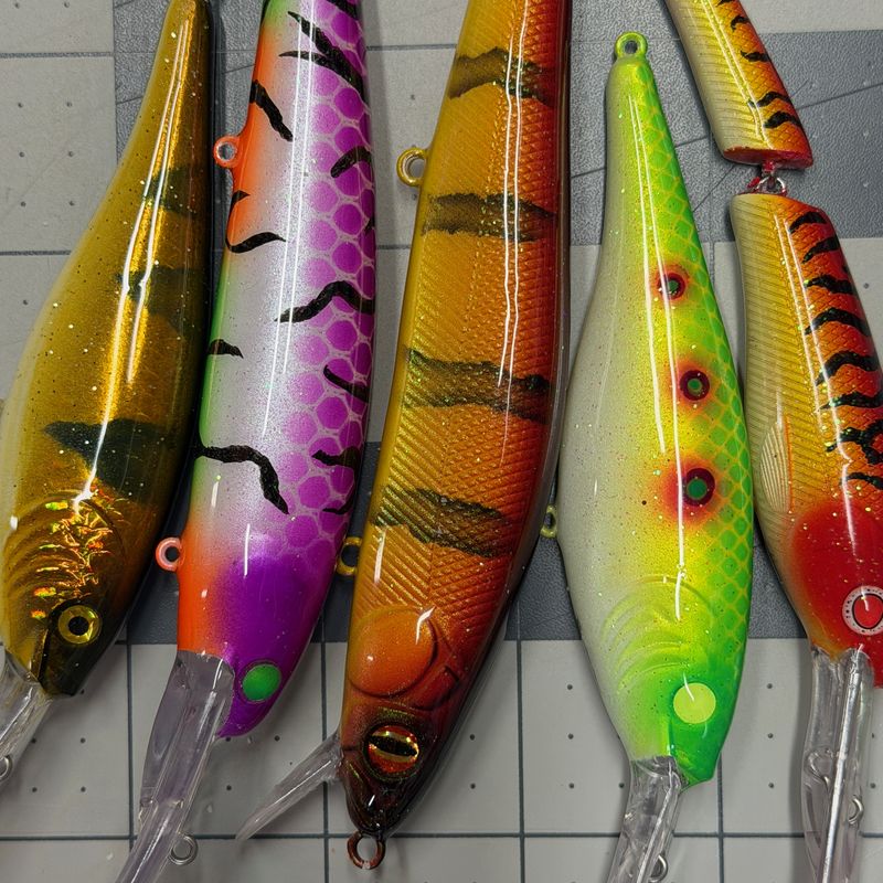 Fresh batch of custom-painted baits on the mat